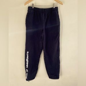 Kids of Immigrants Black sweatpants with pockets and elastic cuffs
